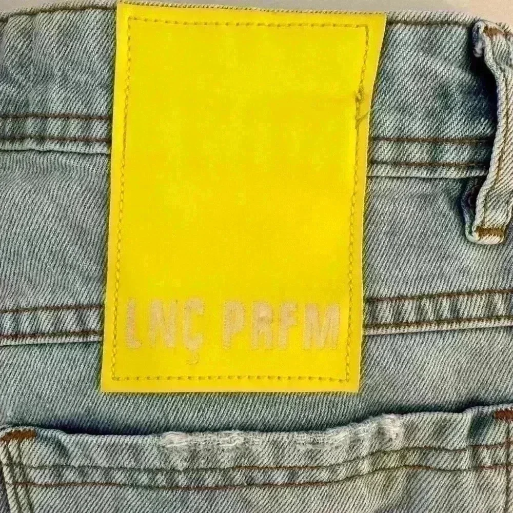 LANCA PERFUME NWOT Raw Hem High Ride W/Yellow Leather Logo Stitched On Sz 38/7